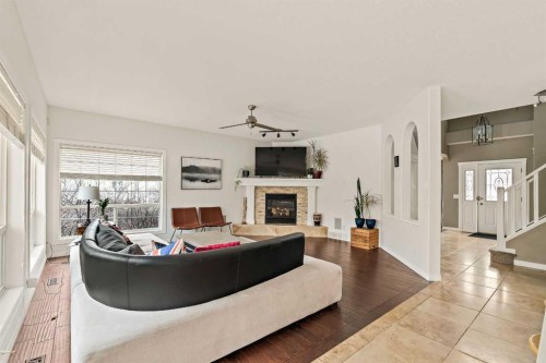 1560 Strathcona Drive Sw, Calgary, AB - Indoor Photo Showing Living Room With Fireplace