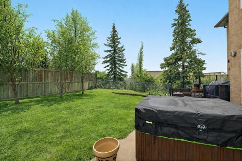 1560 Strathcona Drive Sw, Calgary, AB - Outdoor With Backyard