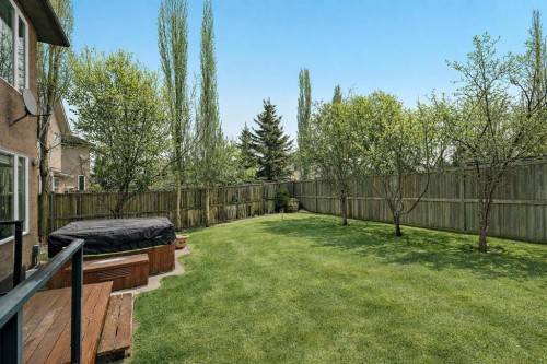 1560 Strathcona Drive Sw, Calgary, AB - Outdoor With Backyard