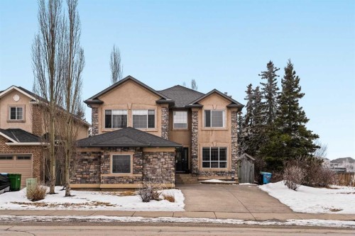 1560 Strathcona Drive Sw, Calgary, AB - Outdoor With Facade