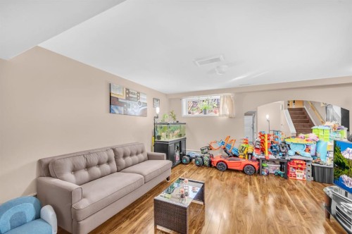207 Elgin Meadows Gardens Se, Calgary, AB - Indoor Photo Showing Living Room