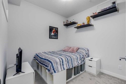 102-500 Auburn Meadows Common Se, Calgary, AB - Indoor Photo Showing Bedroom