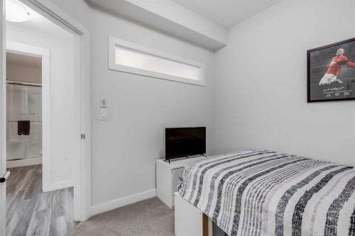 102-500 Auburn Meadows Common Se, Calgary, AB - Indoor Photo Showing Bedroom