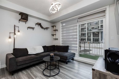 102-500 Auburn Meadows Common Se, Calgary, AB - Indoor Photo Showing Living Room