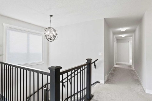 36 Cranbrook Cape Se, Calgary, AB - Indoor Photo Showing Other Room