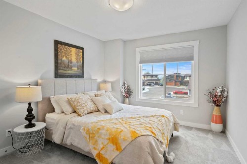 36 Cranbrook Cape Se, Calgary, AB - Indoor Photo Showing Bedroom