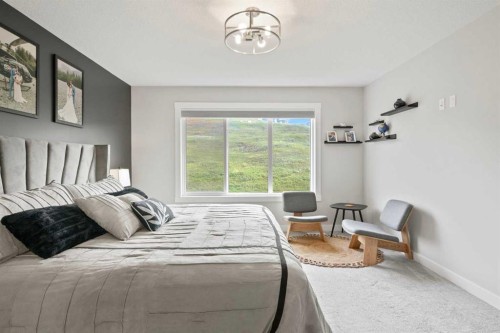 36 Cranbrook Cape Se, Calgary, AB - Indoor Photo Showing Bedroom