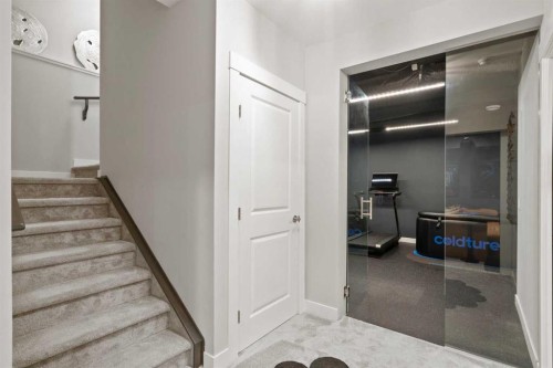36 Cranbrook Cape Se, Calgary, AB - Indoor Photo Showing Other Room