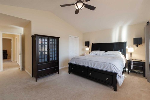 116 Rainbow Falls Grove, Chestermere, AB - Indoor Photo Showing Bedroom
