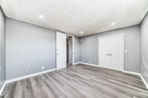 65-6100 4 Avenue Ne, Calgary, AB - Indoor Photo Showing Other Room