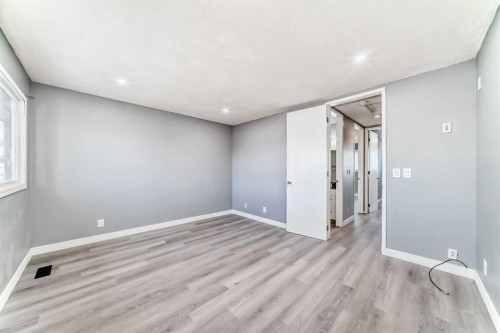 65-6100 4 Avenue Ne, Calgary, AB - Indoor Photo Showing Other Room