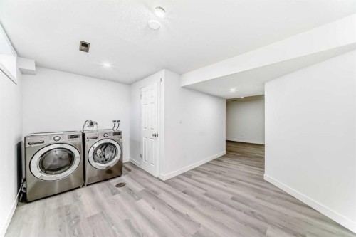 65-6100 4 Avenue Ne, Calgary, AB - Indoor Photo Showing Laundry Room