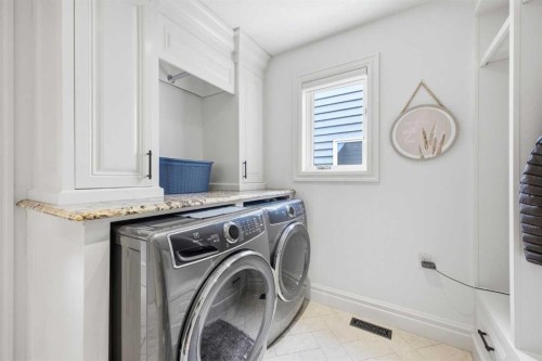 23 Deermoss Place Se, Calgary, AB - Indoor Photo Showing Laundry Room