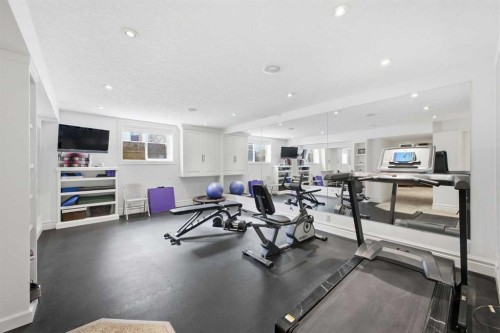23 Deermoss Place Se, Calgary, AB - Indoor Photo Showing Gym Room