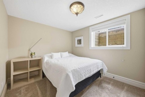23 Deermoss Place Se, Calgary, AB - Indoor Photo Showing Bedroom