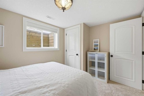 23 Deermoss Place Se, Calgary, AB - Indoor Photo Showing Bedroom