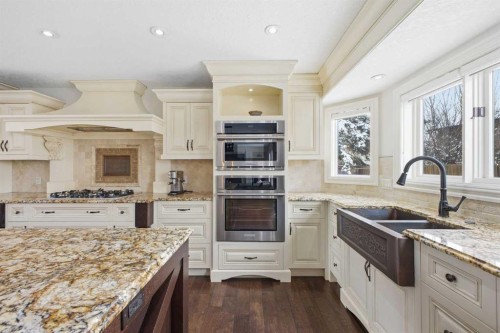 23 Deermoss Place Se, Calgary, AB - Indoor Photo Showing Kitchen With Double Sink With Upgraded Kitchen