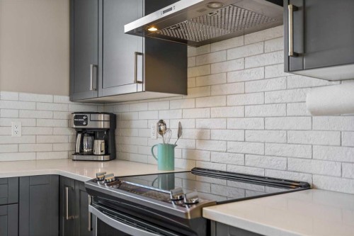 15 Masters Square Se, Calgary, AB - Indoor Photo Showing Kitchen With Upgraded Kitchen