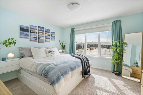 15 Masters Square Se, Calgary, AB - Indoor Photo Showing Bedroom
