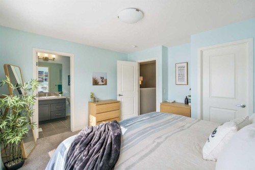 15 Masters Square Se, Calgary, AB - Indoor Photo Showing Bedroom