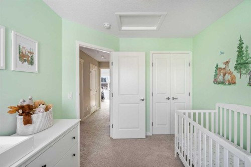 15 Masters Square Se, Calgary, AB - Indoor Photo Showing Bedroom