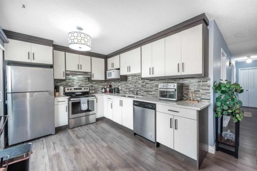 100 Whitehaven Road Ne, Calgary, AB - Indoor Photo Showing Kitchen With Stainless Steel Kitchen With Upgraded Kitchen