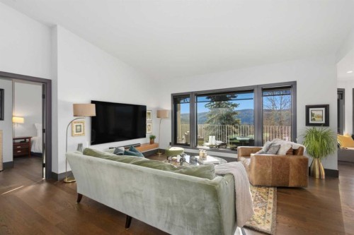 38 Sunrise Way, Priddis Greens, AB - Indoor Photo Showing Living Room