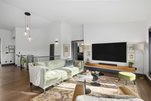 38 Sunrise Way, Priddis Greens, AB - Indoor Photo Showing Living Room