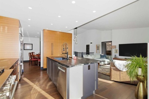 38 Sunrise Way, Priddis Greens, AB - Indoor Photo Showing Kitchen With Upgraded Kitchen