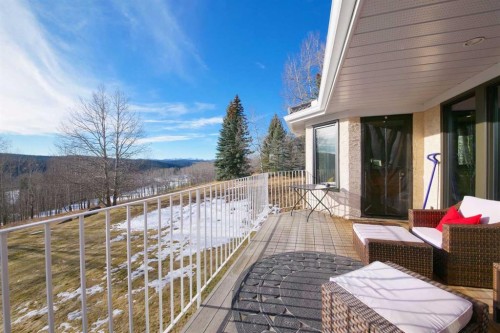 38 Sunrise Way, Priddis Greens, AB - Outdoor With Exterior