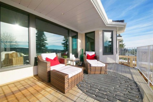 38 Sunrise Way, Priddis Greens, AB - Outdoor With Deck Patio Veranda With Exterior