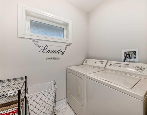 56 Patterson Crescent Sw, Calgary, AB - Indoor Photo Showing Laundry Room
