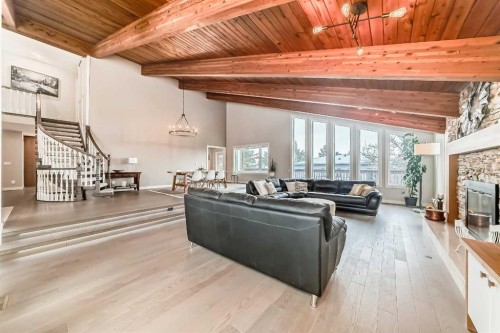 56 Patterson Crescent Sw, Calgary, AB - Indoor Photo Showing Living Room With Fireplace