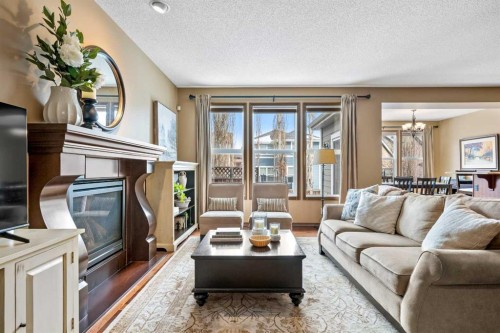 140 Mahogany Terrace Se, Calgary, AB - Indoor Photo Showing Living Room With Fireplace