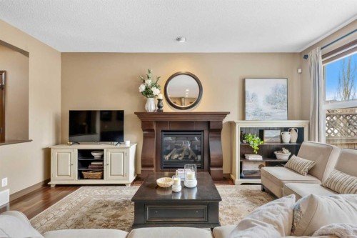 140 Mahogany Terrace Se, Calgary, AB - Indoor Photo Showing Living Room With Fireplace