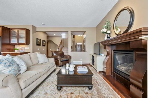 140 Mahogany Terrace Se, Calgary, AB - Indoor Photo Showing Living Room With Fireplace