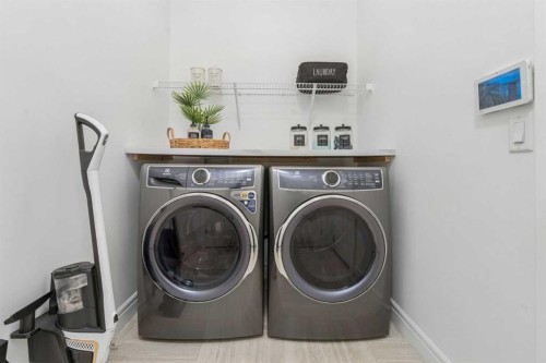 161 Mahogany Square Se, Calgary, AB - Indoor Photo Showing Laundry Room