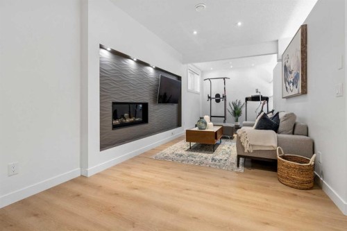 161 Mahogany Square Se, Calgary, AB - Indoor Photo Showing Living Room With Fireplace