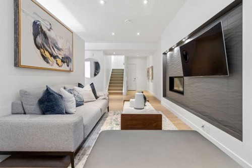 161 Mahogany Square Se, Calgary, AB - Indoor Photo Showing Living Room With Fireplace