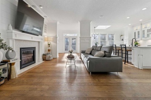 161 Mahogany Square Se, Calgary, AB - Indoor Photo Showing Living Room With Fireplace