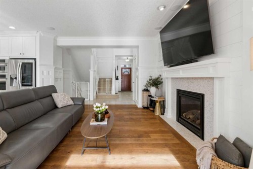 161 Mahogany Square Se, Calgary, AB - Indoor Photo Showing Living Room With Fireplace