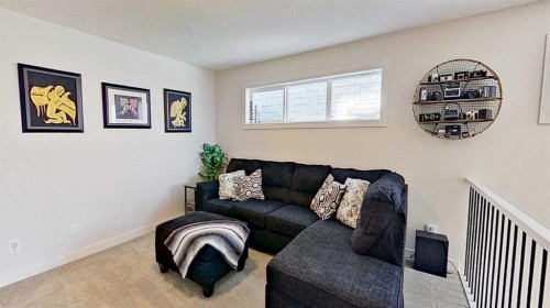 163 Sundown Crescent, Cochrane, AB - Indoor Photo Showing Living Room