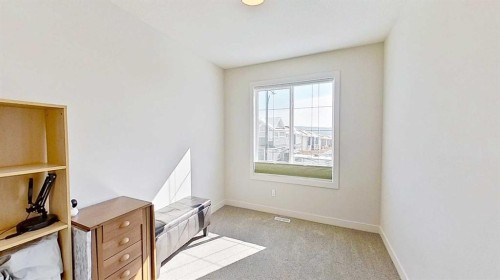 163 Sundown Crescent, Cochrane, AB - Indoor Photo Showing Other Room