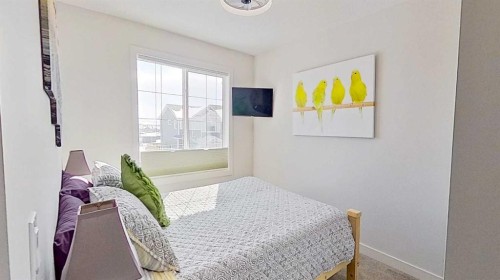 163 Sundown Crescent, Cochrane, AB - Indoor Photo Showing Bedroom