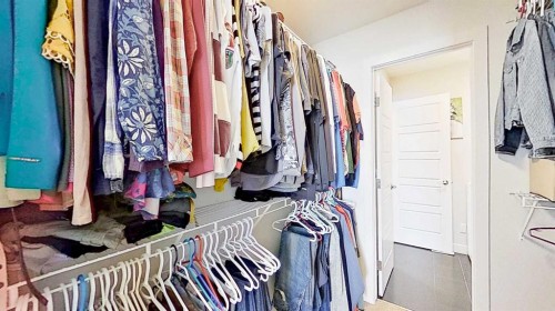 163 Sundown Crescent, Cochrane, AB - Indoor With Storage