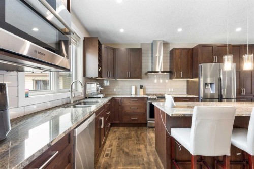 435 Arlington Drive Se, Calgary, AB - Indoor Photo Showing Kitchen With Stainless Steel Kitchen With Double Sink With Upgraded Kitchen