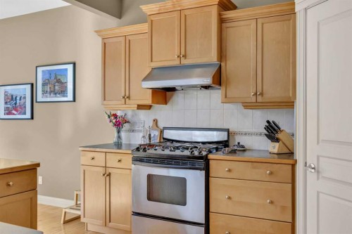 97 Strathridge Close Sw, Calgary, AB - Indoor Photo Showing Kitchen