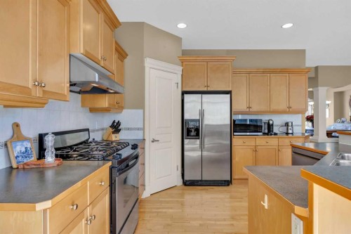 97 Strathridge Close Sw, Calgary, AB - Indoor Photo Showing Kitchen