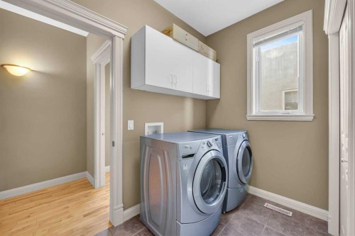 97 Strathridge Close Sw, Calgary, AB - Indoor Photo Showing Laundry Room