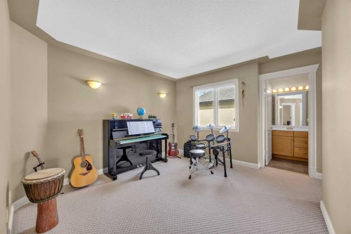 97 Strathridge Close Sw, Calgary, AB - Indoor Photo Showing Other Room